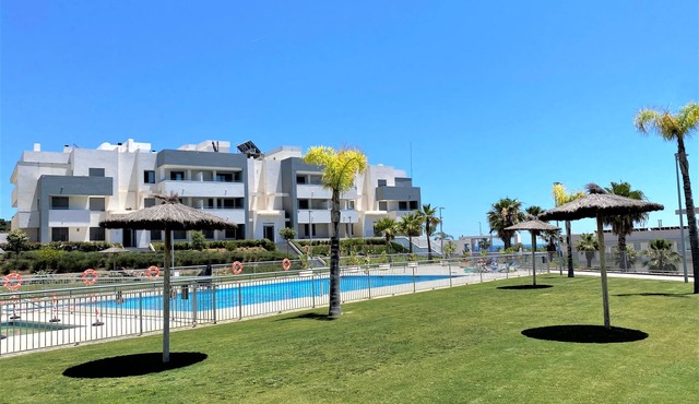 Apartment 'Beautiful Ground Floor in Estepona' with Shared Pool, Wi-Fi and Air Conditioning