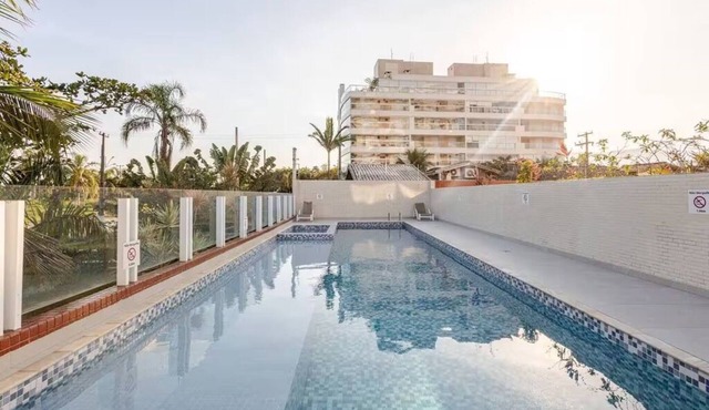 Beautiful beachfront apartment with unobstructed ocean views, pool, and sauna. in Bertioga