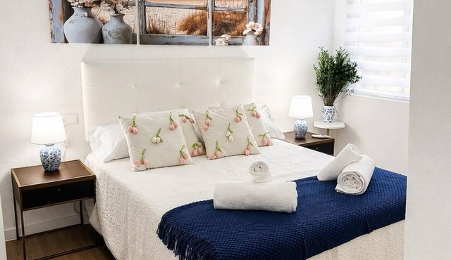 Centrally located two-bedroom apartment with patio. Charming