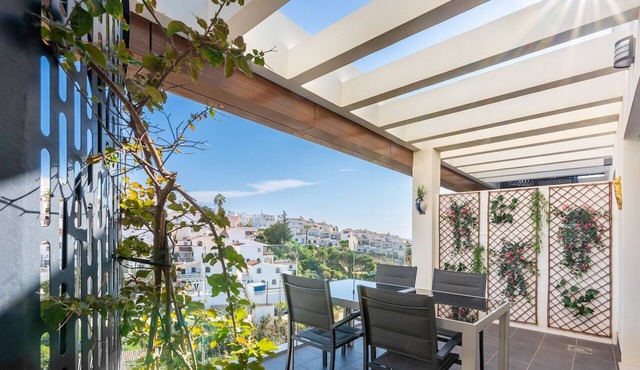 Cozy Penthouse Benajarafe with roof terrace at walking distance of beach