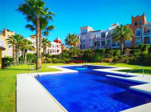 El ático de los flamencos, Apartamentos Living Sur