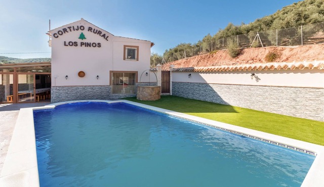 Enjoy a unique view of the countryside in this inviting vacation home with pool.