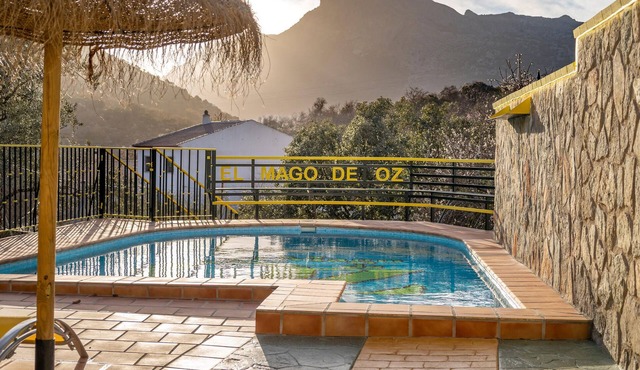 Enjoy a magnificent mountain panorama in this spacious vacation home with pool.