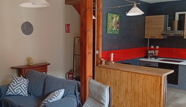 Escape to a restored old miners' house with mountain views