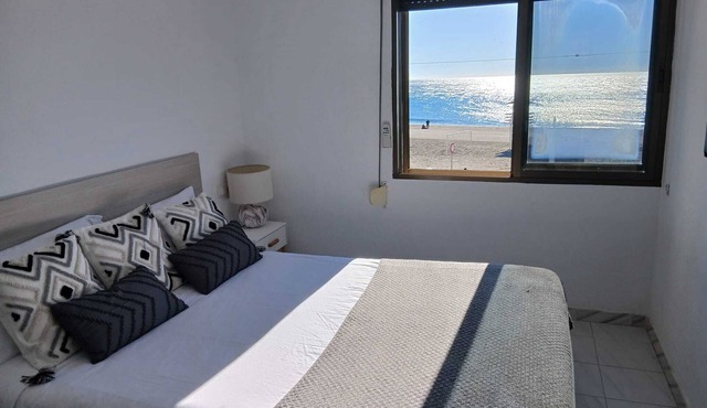 House in first line of beach with spectacular sea views.
