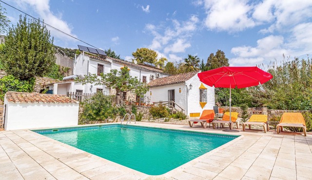 In beautiful green countryside awaits you this charming vacation home with private pool.