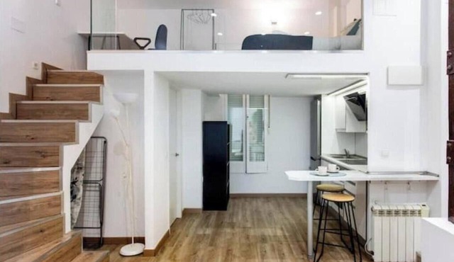 Industrial-style duplex apartment in Centro