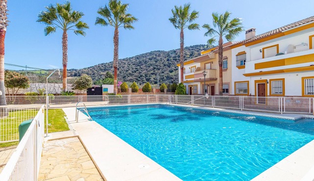Inviting terraced house with panoramic views of the mountains.