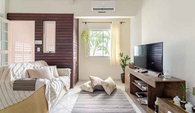 Large and charming apartment with AC near Florianópolis International Airport in Carianos Florianópolis