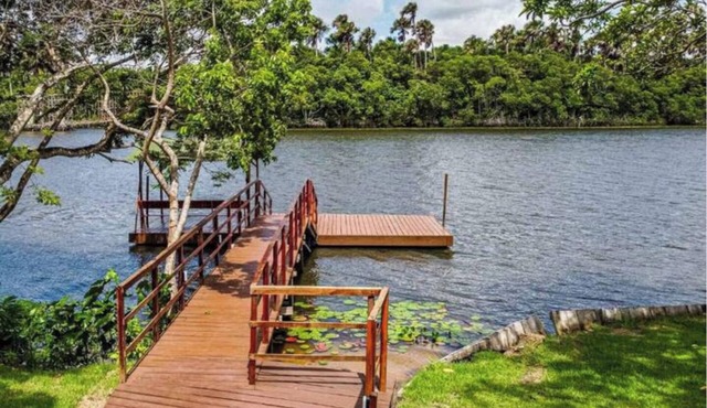 Riverfront with pier and pool in Barreirinhas