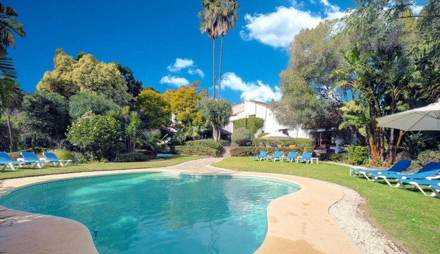 Unique estate located in an enormous fenced plot with 3 properties. All private
