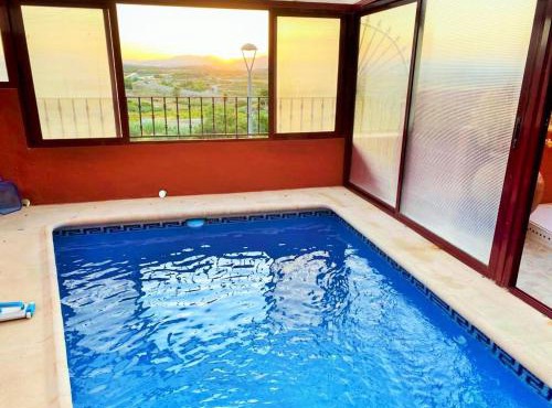 Vivienda de estilo rústico con piscina LA GRANÁ