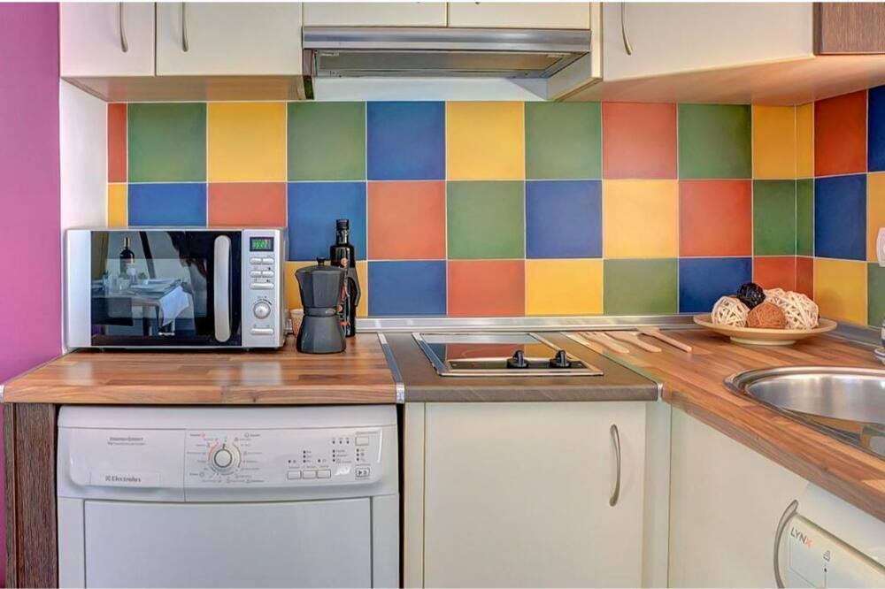 Photo of Kitchen in Tiro de Linea-Santa Genoveva