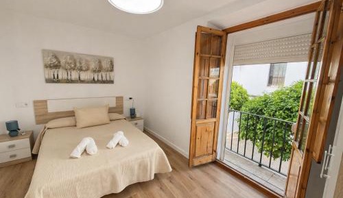 One-Bedroom Apartment with Balcony and City View