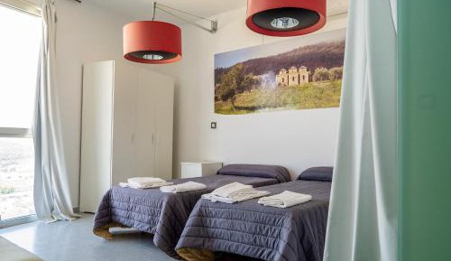 Single Bed in Dormitory Room