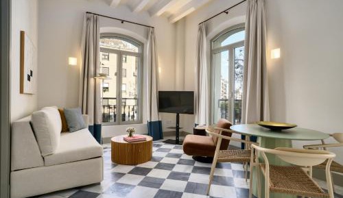 One-Bedroom Apartment with Balcony and City View