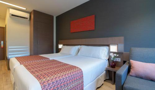 Triple Room (2 Adults + 1 Child)