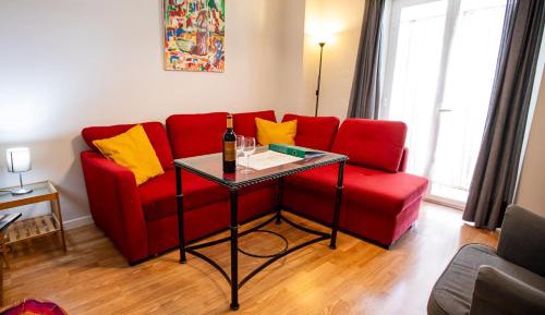 One-Bedroom Apartment with small Balconies and access to a shared terrace