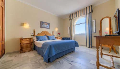Quadruple Room with Shared Bathroom