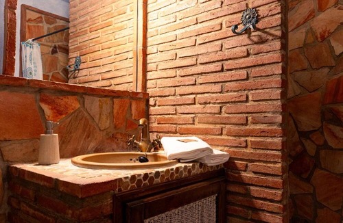 Cuevas del Becerro Apartment | Apartment 'El Pinsapo Casa Rural' with Mountain View, Private Terrace and Air Conditioning