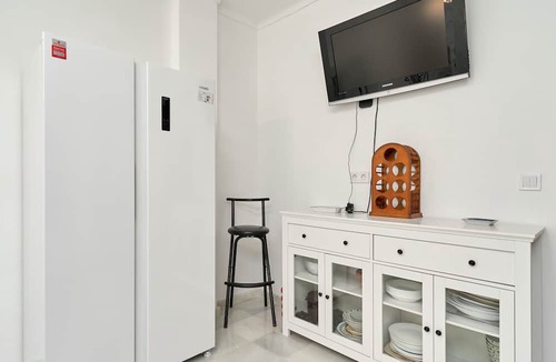 Benajarafe Apartment | Apartment 'Adosado Con Piscina Benajarafe' with Balcony, Wi-Fi and Air Conditioning