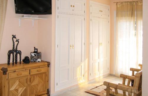 Nuevo Portil Villa | Elegant Villa in Nuevo Portil with Shared Pool