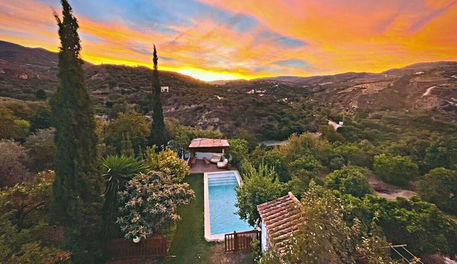 Sunset mountain-view villa with garden & pool